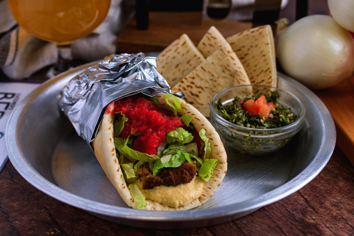Gyro meat, hummus, jalapenos, onions